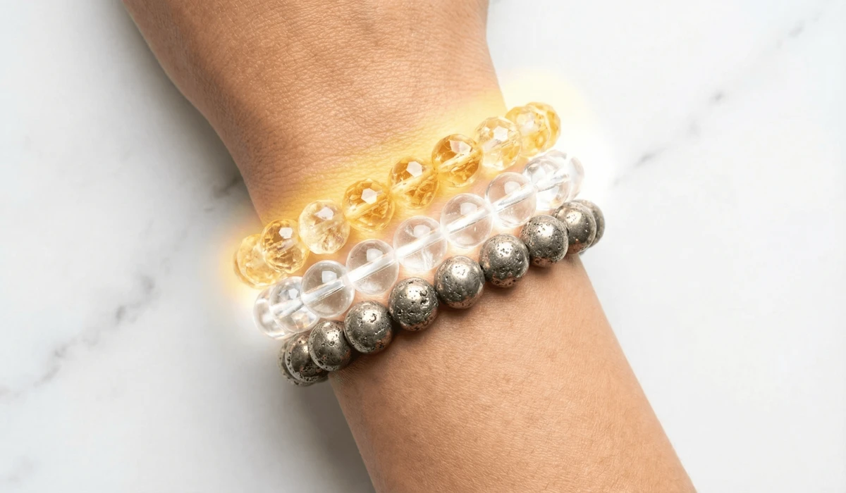 Which Hand Should You Wear Your Crystal Bracelets On? The Meaning of Left vs. Right Wrist 3 - Buddha Bodhis A harmonious stack of wealth-attracting crystal bracelets including Citrine and Pyrite on one wrist.