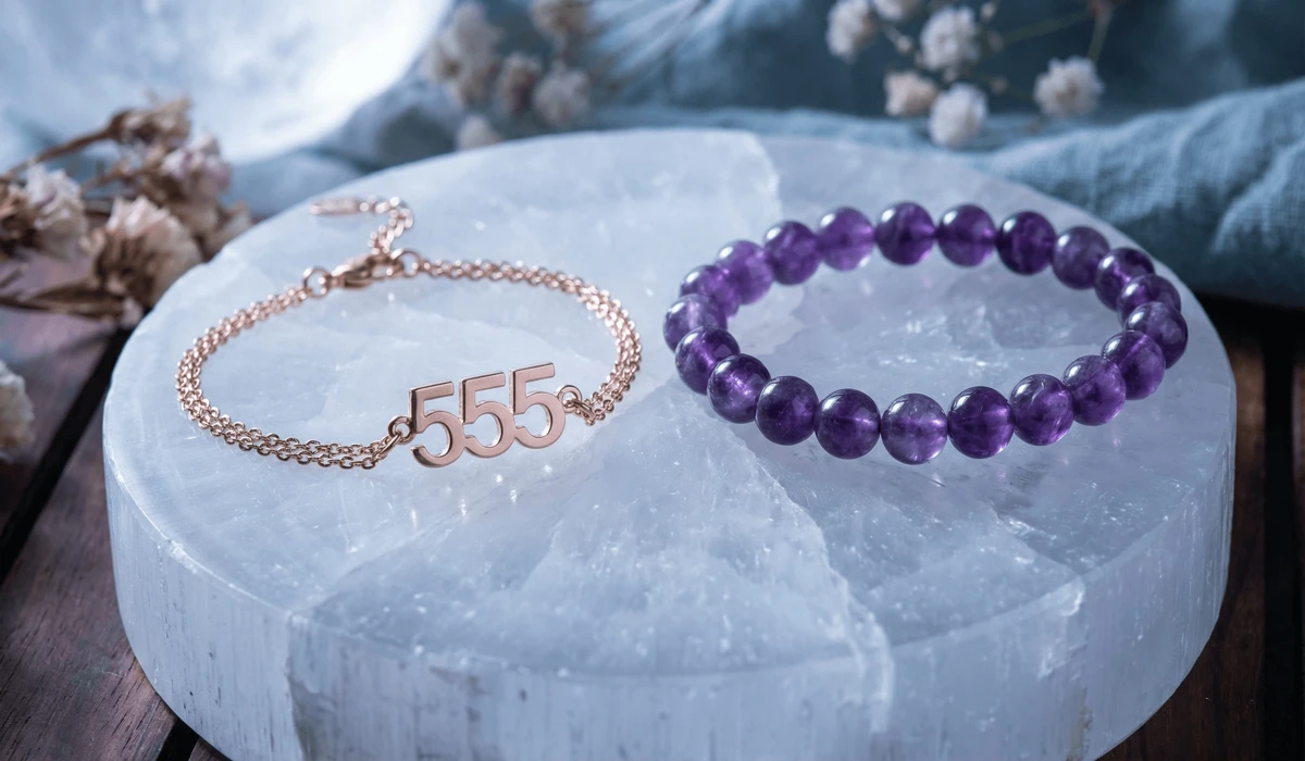 How to Personalize and Activate Your Angel Number Bracelet for Manifestation 3 - Buddha Bodhis An angel number bracelet and a crystal manifestation bracelet being charged on a selenite plate under moonlight.
