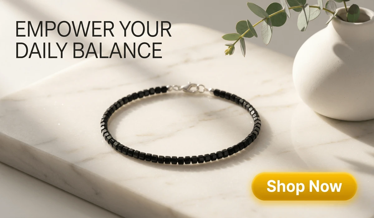 Understanding the Angel Number Jewelry Trend and Its Divine Meaning 2 - Buddha Bodhis Dainty 2mm natural black tourmaline square bead bracelet on a marble surface with a Shop Now button, featuring minimalist protection jewelry design.
